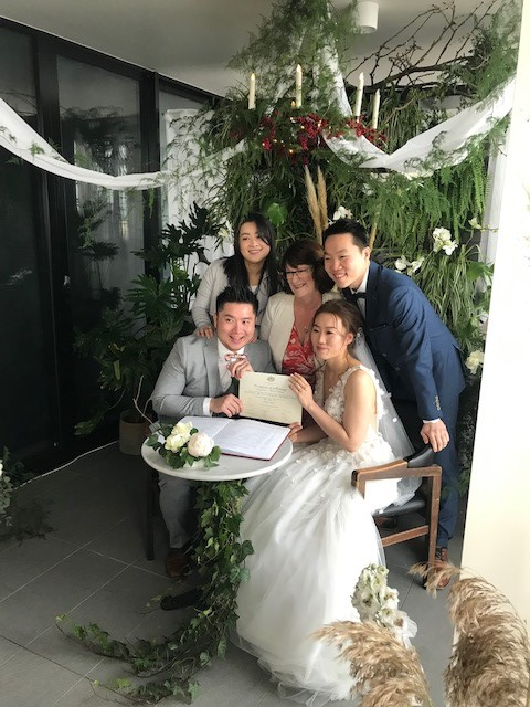 signing_the_marraige_register_annette_james_celebrant